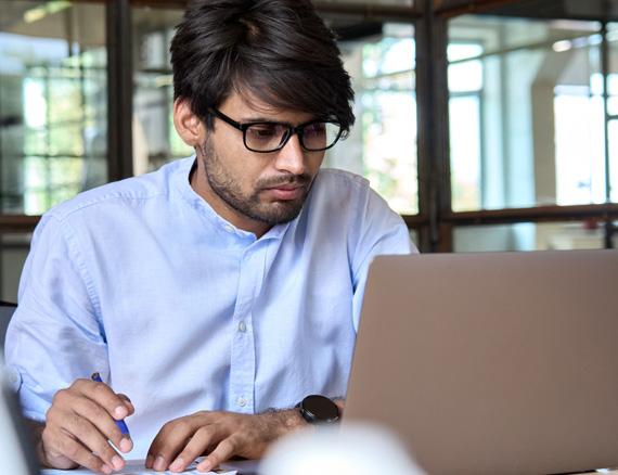 Man viewing content on his laptop